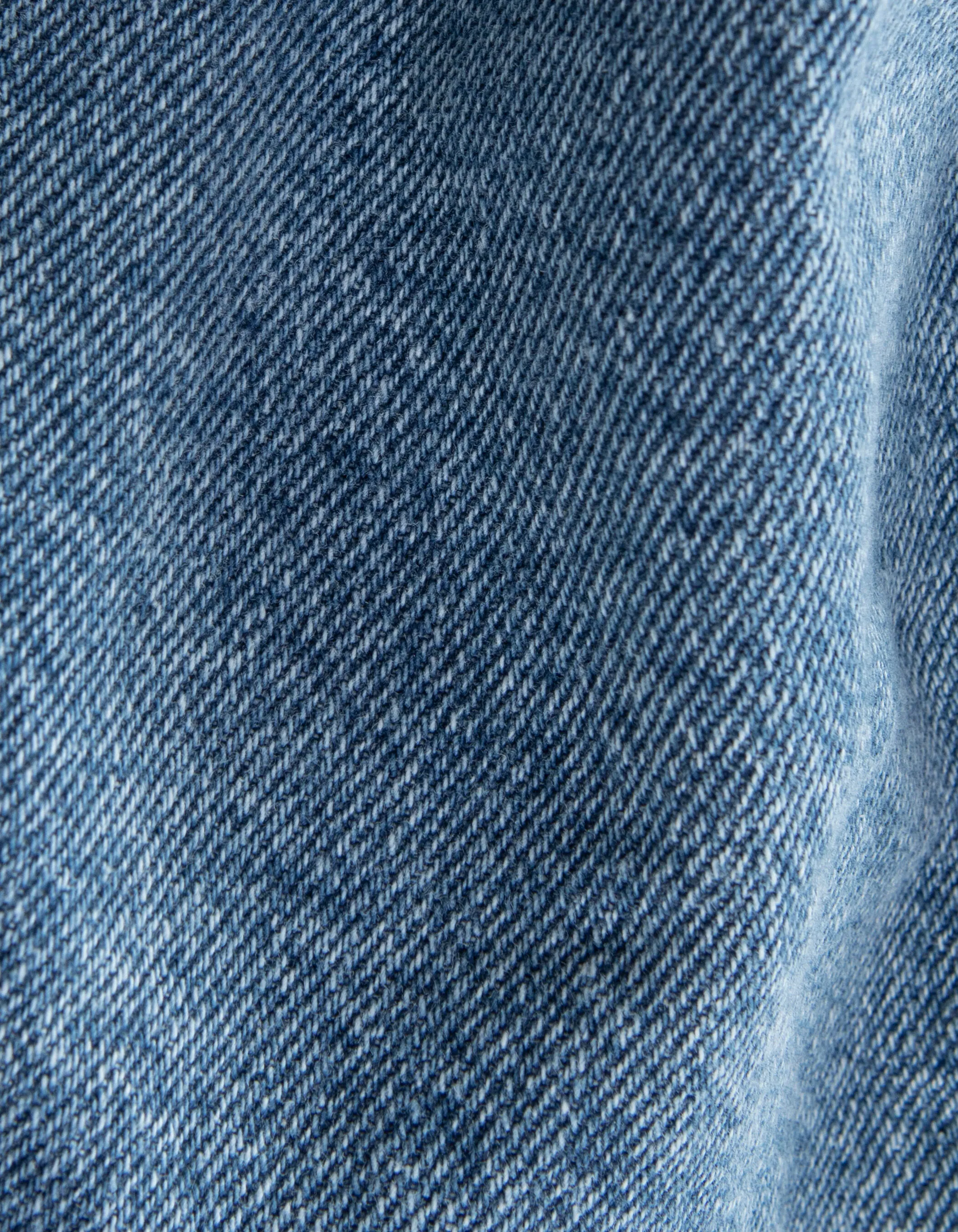 Blue denim shorts with waterless finish and embroidered details for girls