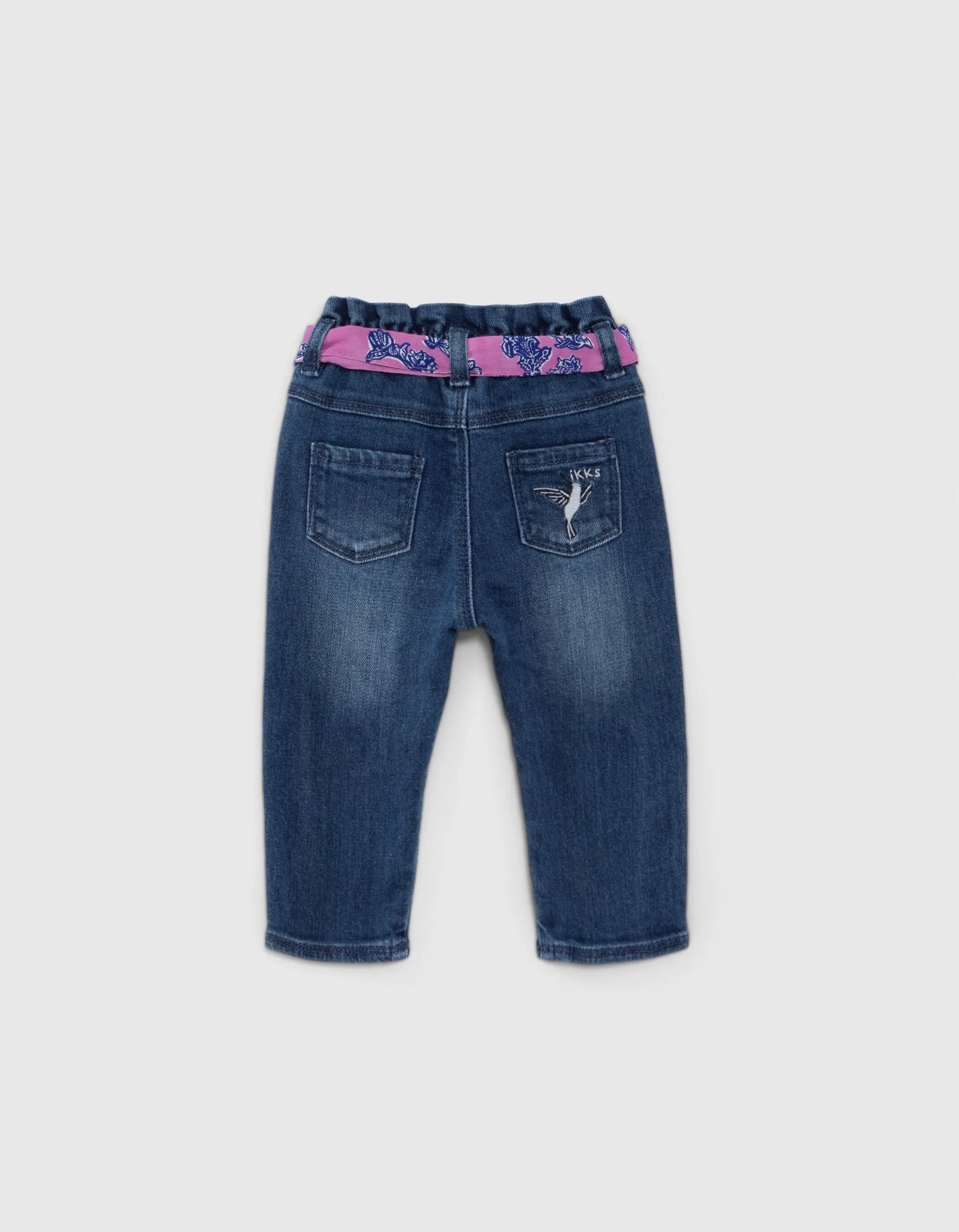 Blue jeans and mauve belt-scarf baby girl