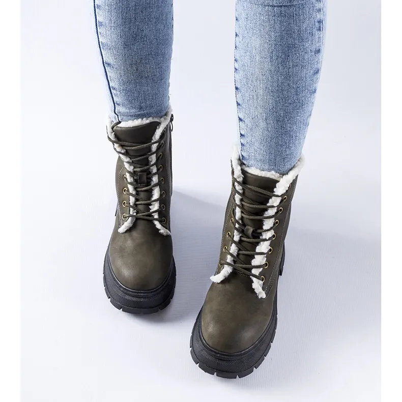 green insulated boots by Tadasuni