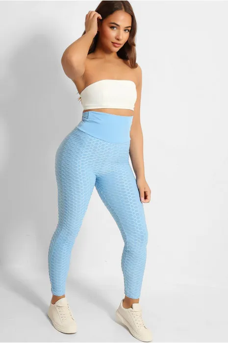 High-waisted turquoise anti-cellulite slimming push-up leggings with back bow.