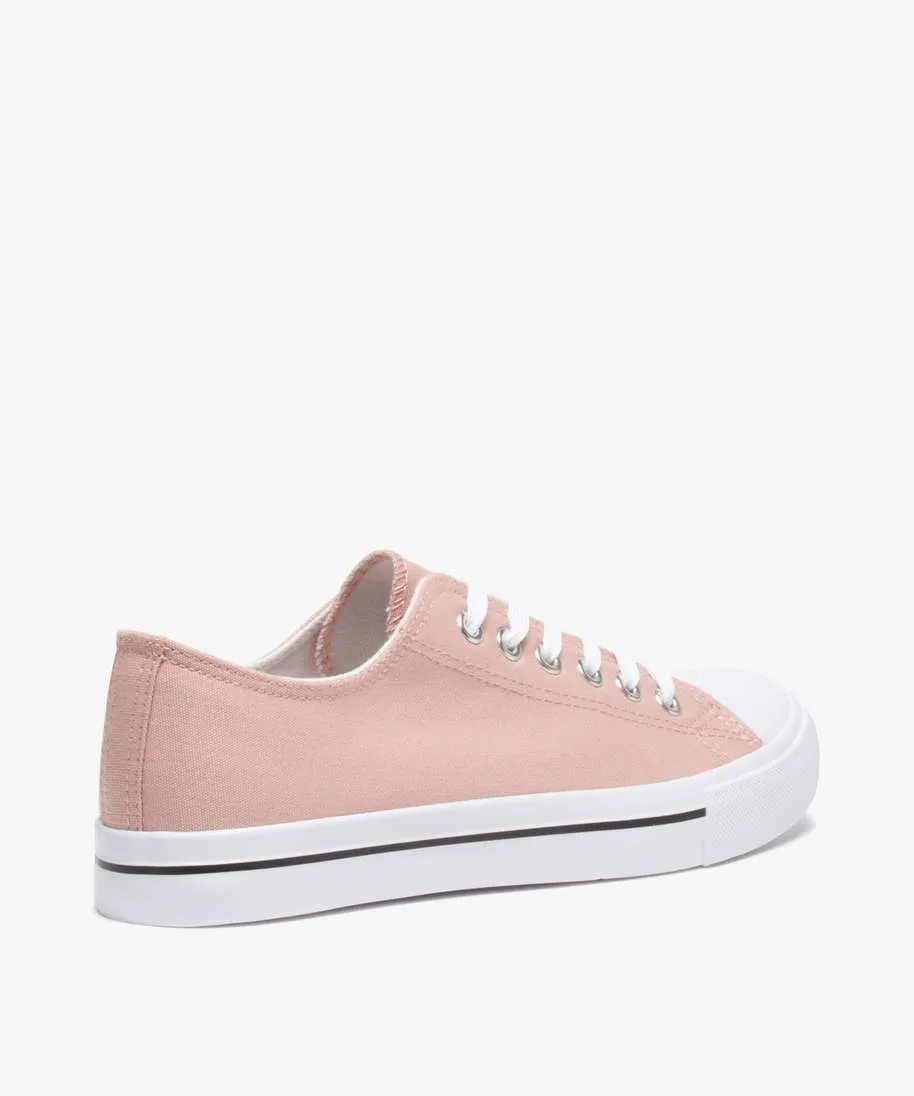 pink canvas women's sneakers reinforced toe lace-up closure.